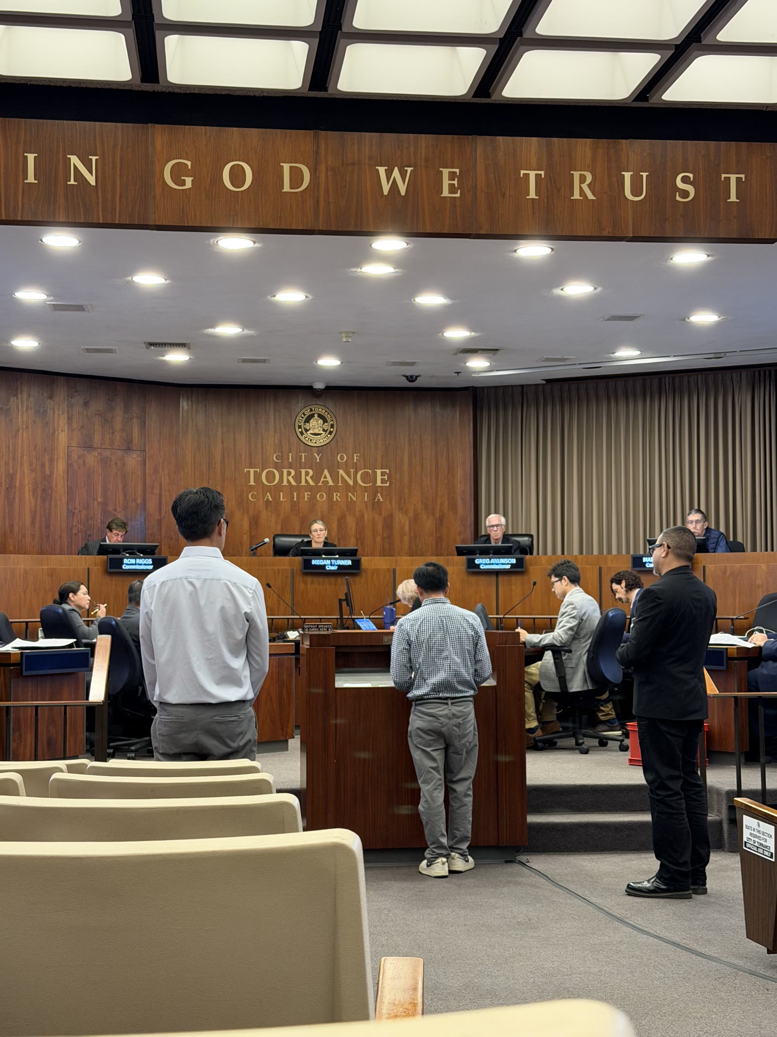 Our team at the podium in front of the Torrance Planning Commission